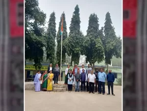 Flag hoisting ceremony at Janata College, Satmile, Dhenkanal, on the occasion of the 76th Republic Day, with students saluting the tricolor.